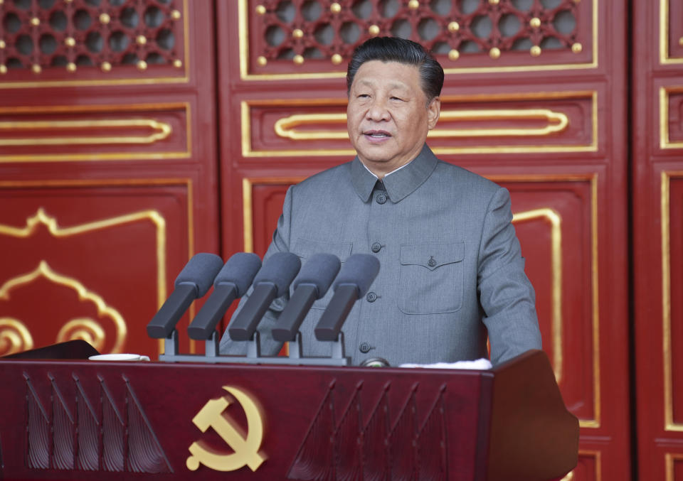 In this photo provided by China's Xinhua News Agency, Chinese President and party leader Xi Jinping delivers a speech at a ceremony marking the centenary of the ruling Communist Party in Beijing, China, Thursday, July 1, 2021. (Li Xueren/Xinhua via AP)