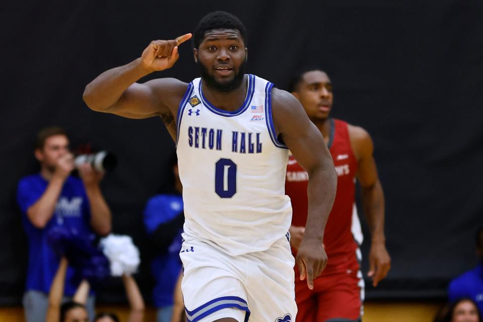 Dylan Addae-Wusu of the Seton Hall Pirates gestures after a dunk against the Saint Joseph's Hawks.