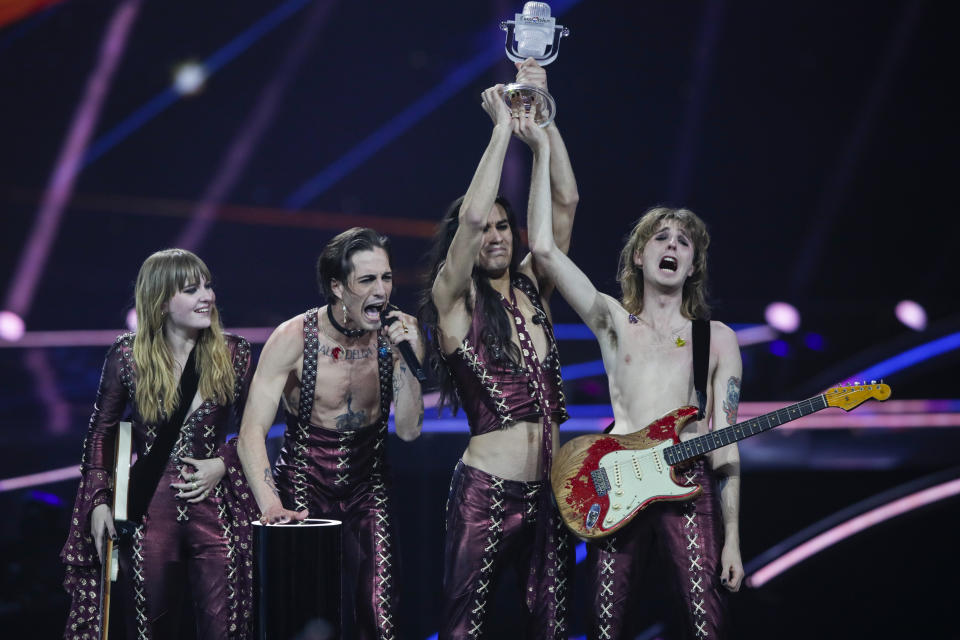 FILE - Maneskin from Italy receive the trophy after winning the Grand Final of the Eurovision Song Contest at Ahoy arena in Rotterdam, Netherlands, May 22, 2021. The 68th Eurovision Song Contest is taking place in May in Malmö, Sweden. It will see acts from 37 countries vie for the continent’s pop crown. Founded in 1956, Eurovision is a feelgood extravaganza that strives to banish international strife and division. It’s known for songs that range from anthemic to extremely silly, often with elaborate costumes and spectacular staging. (AP Photo/Peter Dejong, File)