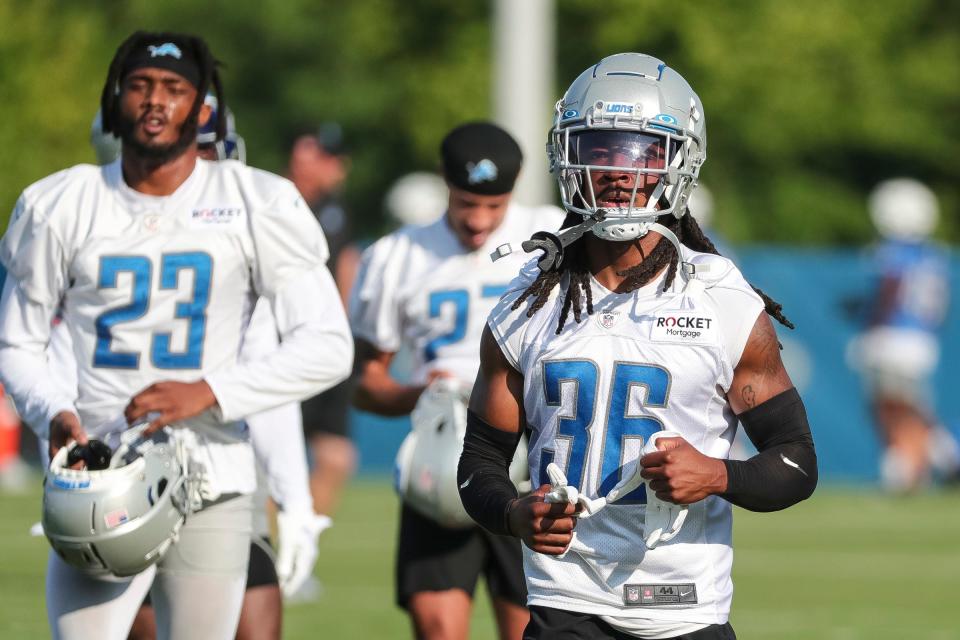 Detroit Lions cornerback Steven Gilmore warm up at the Detroit Lions Headquarters and Training Facility in Allen Park on Sunday, July 23, 2023.