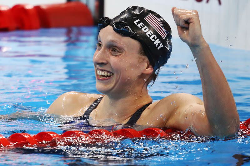 FILE PHOTO: Katie Ledecky (USA) reacts after winning and setting a new world record in Olympic women's 800m freestyle final