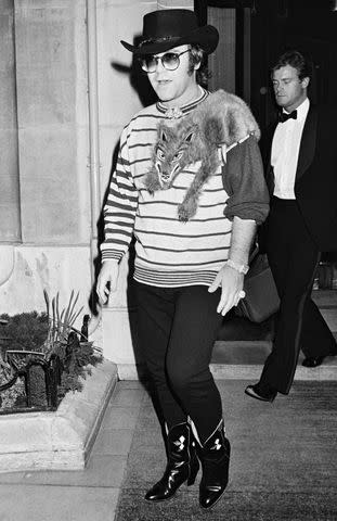 <p>Bertrand Rindoff Petroff/Getty</p> A young Elton John