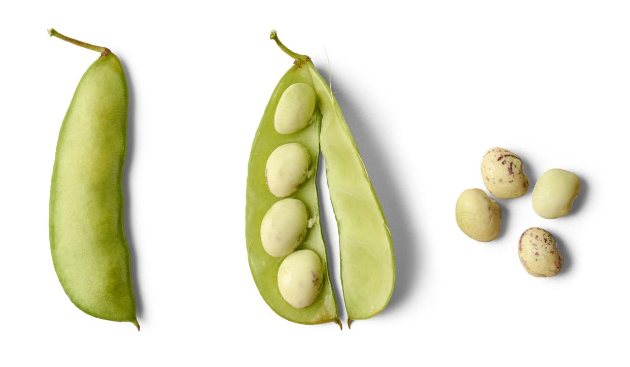 pea pods with open pod and visible immature seeds, type of legume that is widely cultivated for its nutritious seeds and pods, harvested vegetable isolated on white background, taken from above