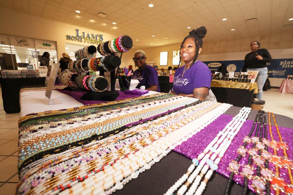 From left, Pheme Davis and Leona Eastman, co-owners of True Beauty Beads, are vendors at a women-owned pop-up market at the Westgate Mall on Saturday, March 25, 2023.