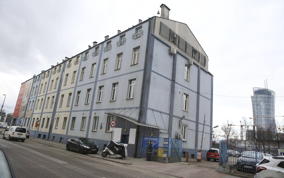 A plot of land and an old building that would have to be torn down if a foundation headed by Poland's ruling party leader Jaroslaw Kaczynski was to go ahead with its plan to build twin towers there, in Warsaw, Poland, Monday, Feb. 11, 2019. The plan has put Kaczynski in political dire straits. Kaczynski's public image being that of restraint and honesty, he is at the center of a scandal involving him negotiating the multi-million euro construction project, even though the law bans political parties from doing business. (AP Photo/Czarek Sokolowski)