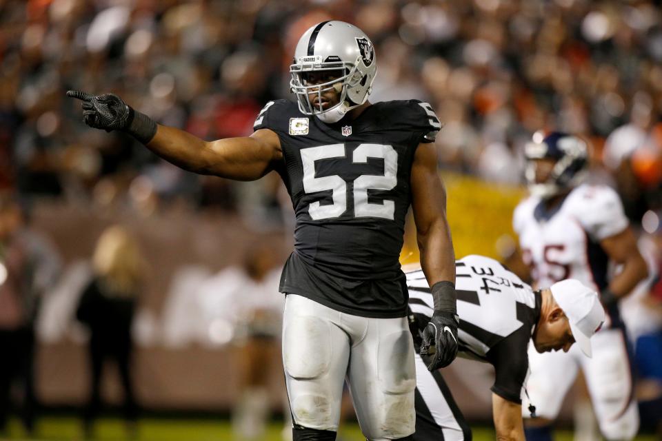 Nov 6, 2016; Oakland, CA, USA; Oakland Raiders defensive end Khalil Mack (52) points towards the crowd after a defensive stop against the Denver Broncos in the third quarter at Oakland Coliseum. The Raiders defeated the Broncos 30-20. Mandatory Credit: Cary Edmondson-USA TODAY Sports