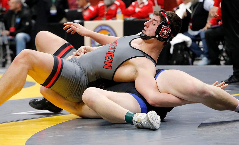 Crestview’s Caleb Cunningham works to pin Harrison Central’s Landen Thomas in the first period during their 285lbs Division III championship match at the OHSAA State Wrestling Championships Sunday, March 10, 2024 at the Jerome Schottenstein Center. TOM E. PUSKAR/MANSFIELD NEWS JOURNAL