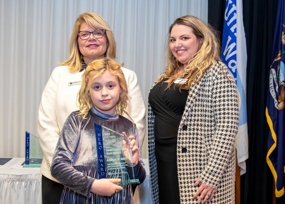 Youth Good Samaritan Hero Addison St. Andre stands with Gretchen Eyler and Ashleigh Glass.