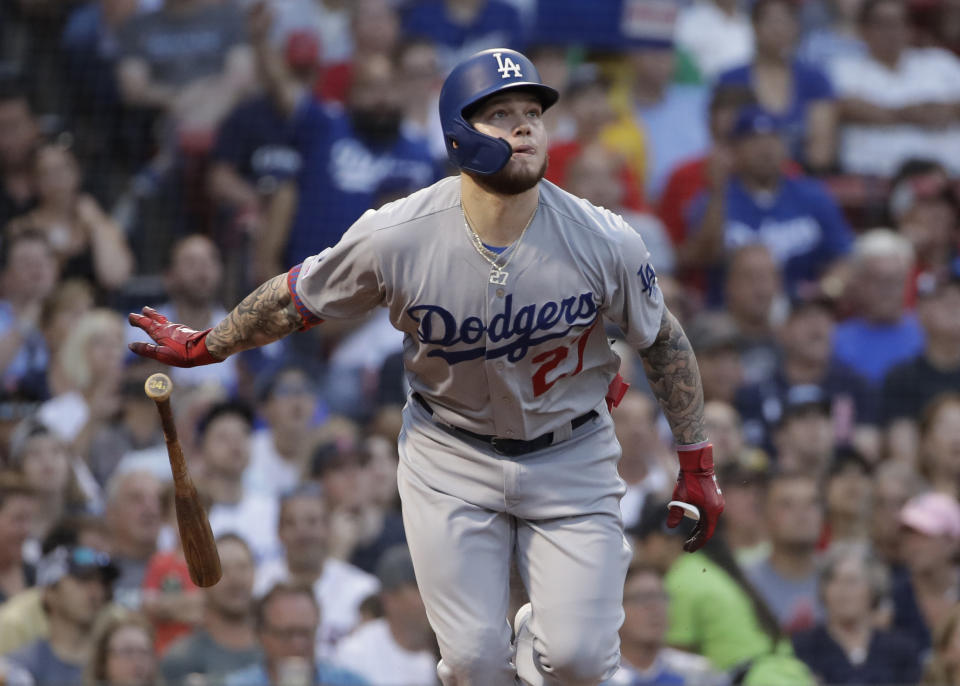 FILE - In this Friday, July 12, 2019 file photo, Los Angeles Dodgers' Alex Verdugo watches his solo home run during the second inning of the team's baseball game against the Boston Red Sox at Fenway Park in Boston. With less than a week before pitchers and catchers were scheduled to report to spring training, the Red Sox sent Mookie Betts and David Price to the Los Angeles Dodgers in a deal that brought outfielder Alex Verdugo and Twins pitching prospect Brusdar Graterol to Boston. (AP Photo/Elise Amendola, File)