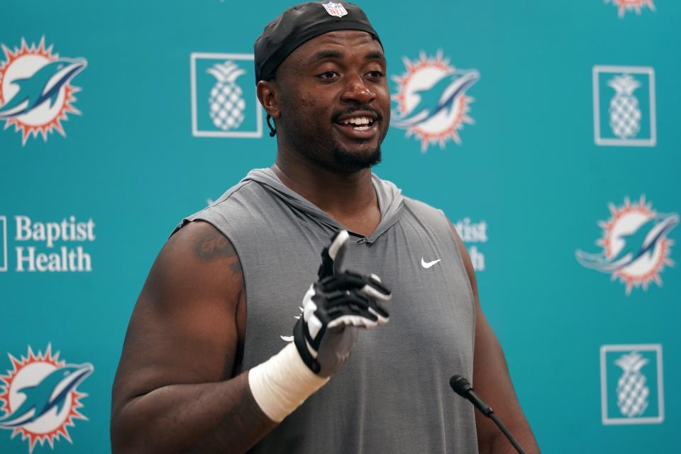 Miami Dolphins offensive lineman Austin Jackson responds to a question at the NFL football team's practice facility, Friday, July 29, 2022, in Miami Gardens, Fla. (AP Photo/Marta Lavandier)