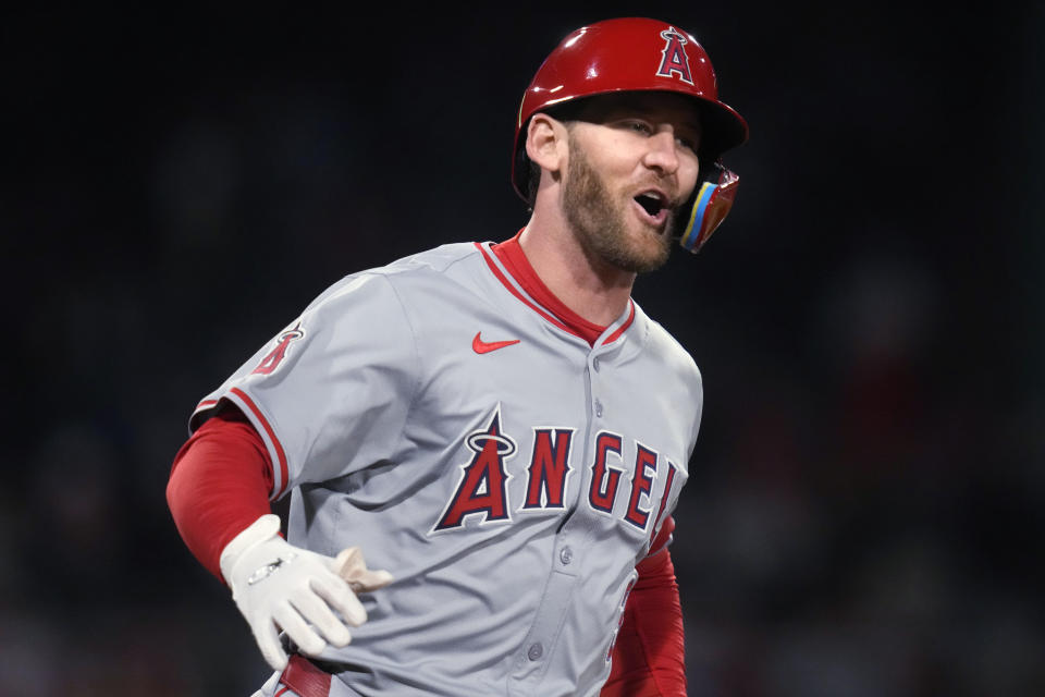 Los Angeles Angels outfielder Taylor Ward smiles while running the bases on his two-run home run against the Boston Red Sox during the sixth inning of a baseball game Friday, April 12, 2024, in Boston. (AP Photo/Charles Krupa)