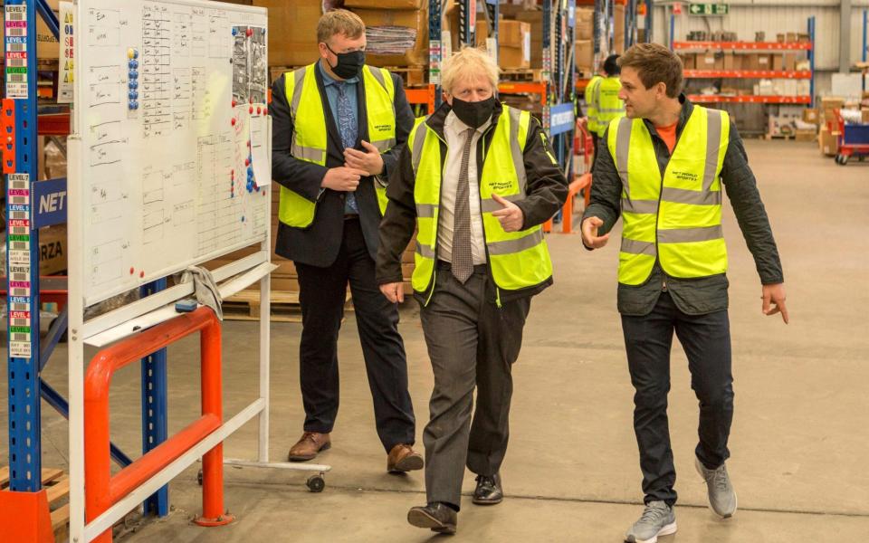 Britain's Prime Minister Boris Johnson in Wrexham on Monday - ROB FORMSTONE/AFP