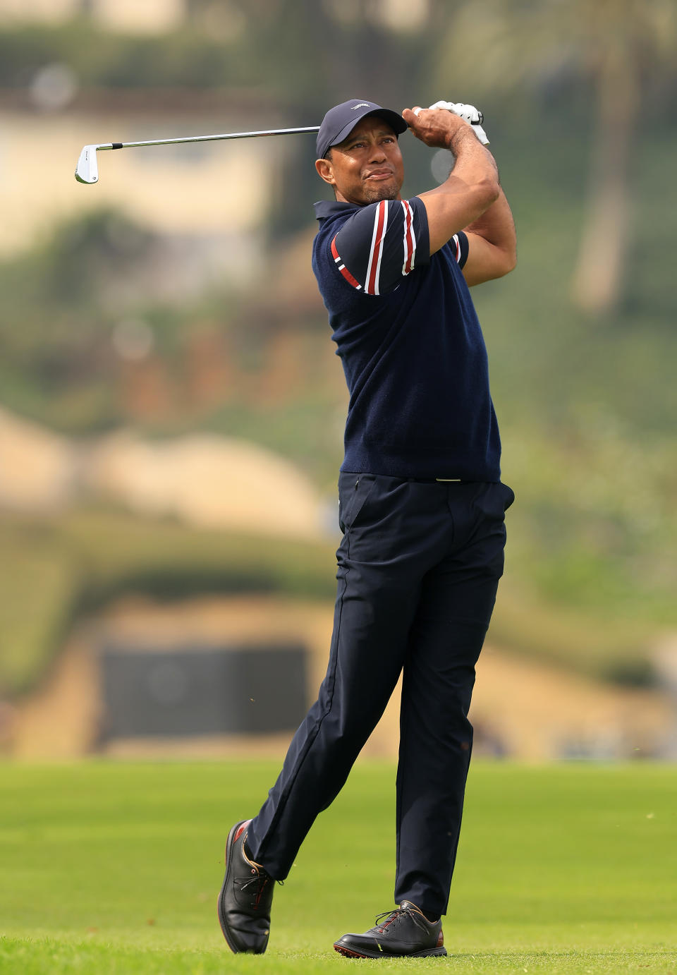 PACIFIC PALISADES, CALIFORNIA - FEBRUARY 16:  Tiger Woods of the United States plays a shot on the first holeduring the second round of The Genesis Invitational at Riviera Country Club on February 16, 2024 in Pacific Palisades, California. (Photo by Sean M. Haffey/Getty Images)