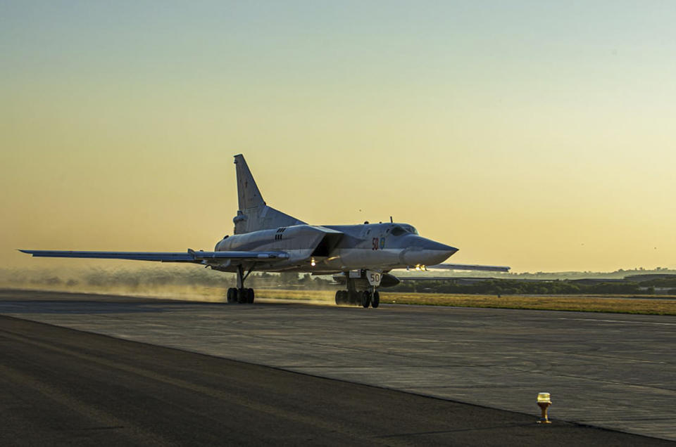 In this photo released by Russian Defense Ministry Press Service on Friday, June 25, 2021, a Tu-22M3 bomber of the Russian air force takes off from the Hemeimeem air base in Syria. The Russian military on Friday launched sweeping maneuvers in the Mediterranean Sea featuring warplanes capable of carrying hypersonic missiles, a show of force amid a surge in tensions following an incident with a British destroyer in the Black Sea. (Russian Defense Ministry Press Service via AP)