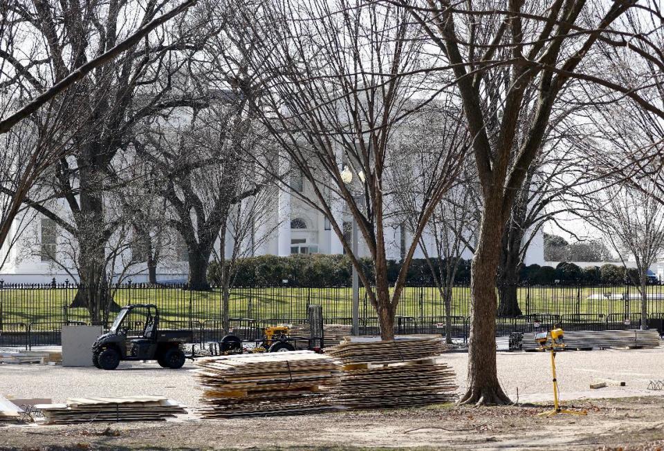 In this photo taken Feb. 17, 2017, construction material is seen along Pennsylvania Avenue in front of the White House in Washington, as work continues with the dismantling of the presidential inauguration reviewing stand. (AP Photo/Pablo Martinez Monsivais)