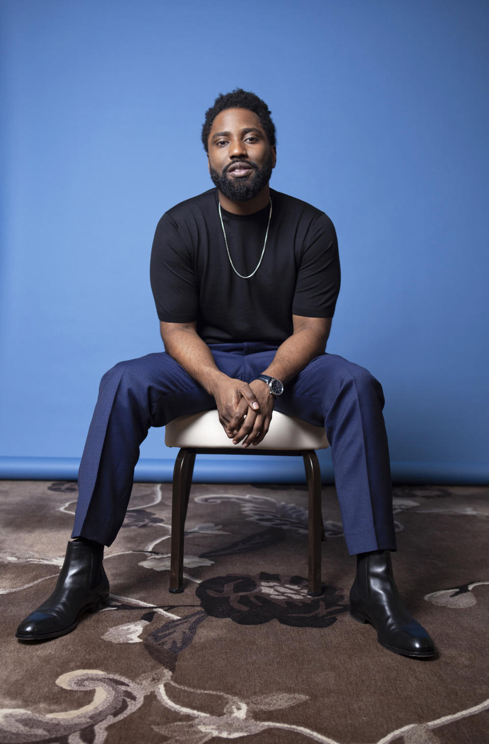 FILE - In this Nov. 14, 2018 photo, actor John David Washington poses for a portrait at the Four Seasons Hotel in Los Angeles. Washington stars in the Christopher Nolan film "Tenet." (Photo by Rebecca Cabage/Invision/AP, File)