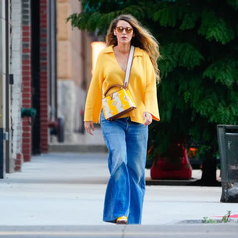 Blake Lively's Collared Yellow Sweater and Flared Jeans Are So '70s