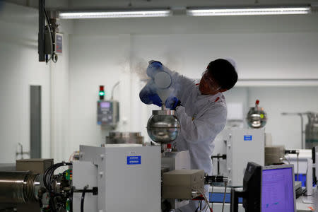 A scientist fills liquid nitrogen in a thermal ionisation mass spectrometer (TIMS) in the International Atomic Energy Agency (IAEA) nuclear material laboratory in Seibersdorf, Austria June 13, 2018. Picture taken June 13, 2018. REUTERS/Leonhard Foeger