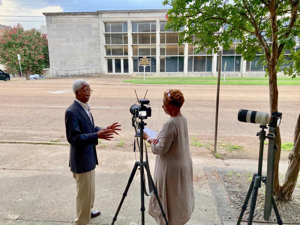 USA TODAY journalist Deborah Berry, right, speaks with Jerry Keahey, who drove the Tougaloo Nine in 1961.