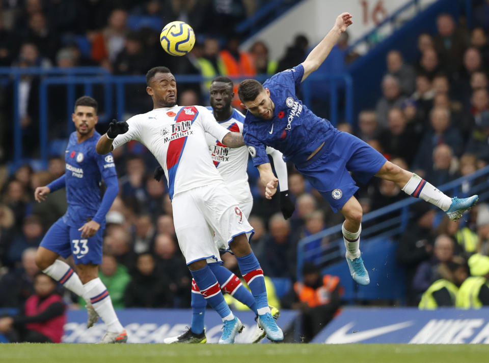 Chelsea's Mateo Kovacic, right, challenges Crystal Palace's Jordan Ayew during their English Premier League soccer match between Chelsea and Crystal Palace at Stamford Bridge stadium in London, Saturday, Nov. 9, 2019. (AP Photo/Alastair Grant)