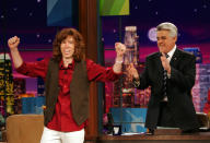 <p>Snowboarder Shaun White, also known and “The Flying Tomato,” who wan a gold medal in the Men’s Halfpipe Snowboard competition at the Turin 2006 Winter Olympic Games acknowledges the audience as Tonight Show host Jay Leno looks on, Thursday, Feb. 16, 2006, in Burbank Calif. (AP Photo/Mark J. Terrill) </p>