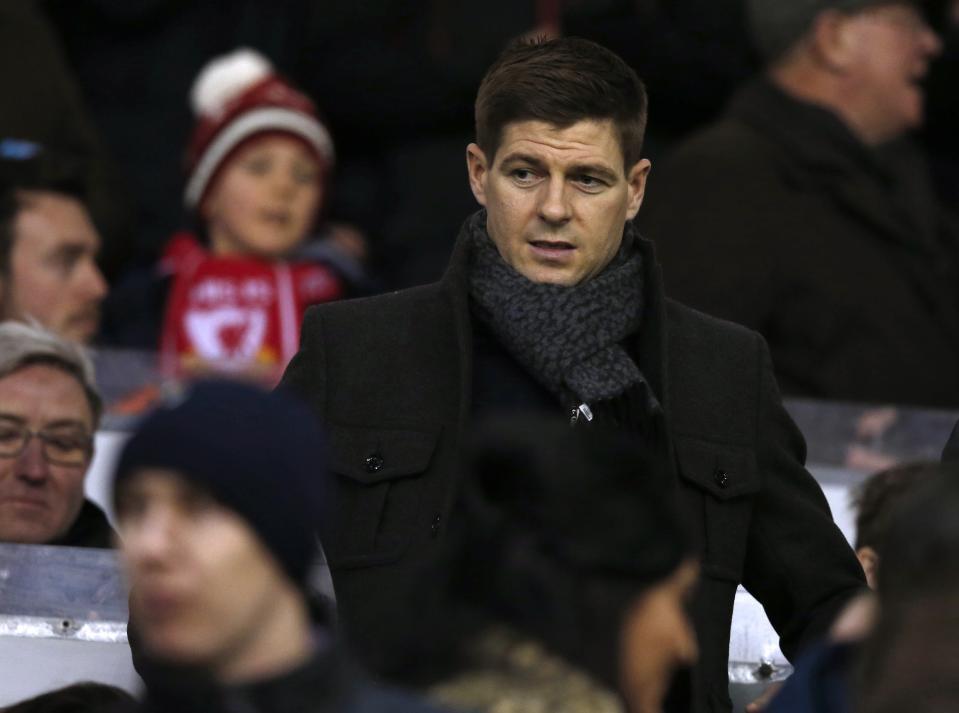 Liverpool's Steven Gerrard takes his seat in the stand during their FA Cup fourth round soccer match against Bolton Wanderers at Anfield in Liverpool, northern England January 24, 2015. REUTERS/Phil Noble (BRITAIN - Tags: SPORT SOCCER)