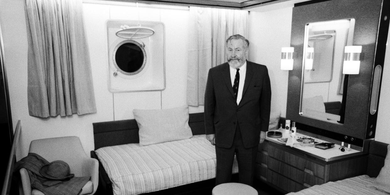 William Wawick, captain of the QE2, in a mock up of a typical tourist class cabin