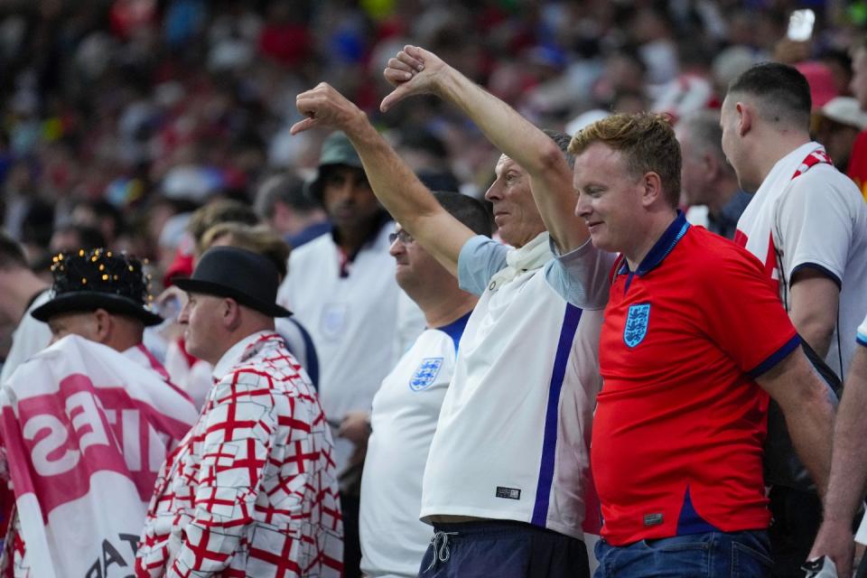 England supporters on the stands during the World Cup group B football match between England and The United States, at the Al Bayt Stadium in Al Khor , Qatar, Friday, Nov. 25, 2022. (AP Photo/Ashley Landis)