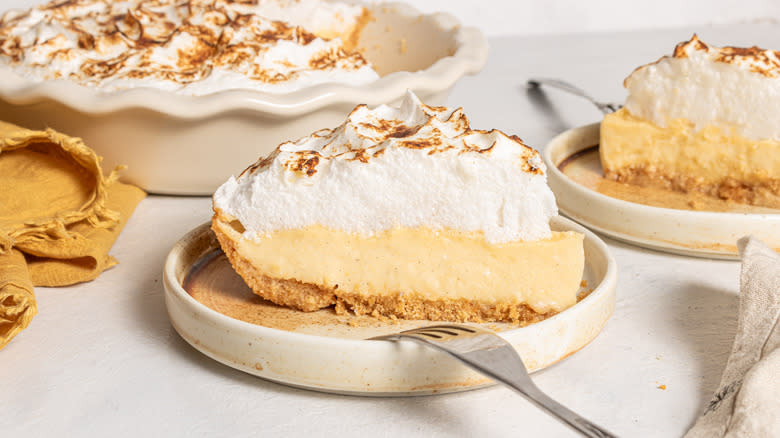 Slice of Canadian flapper pie on a plate with a fork