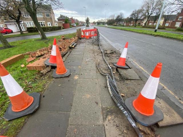 Railings and wall demolished after serious collision sparks