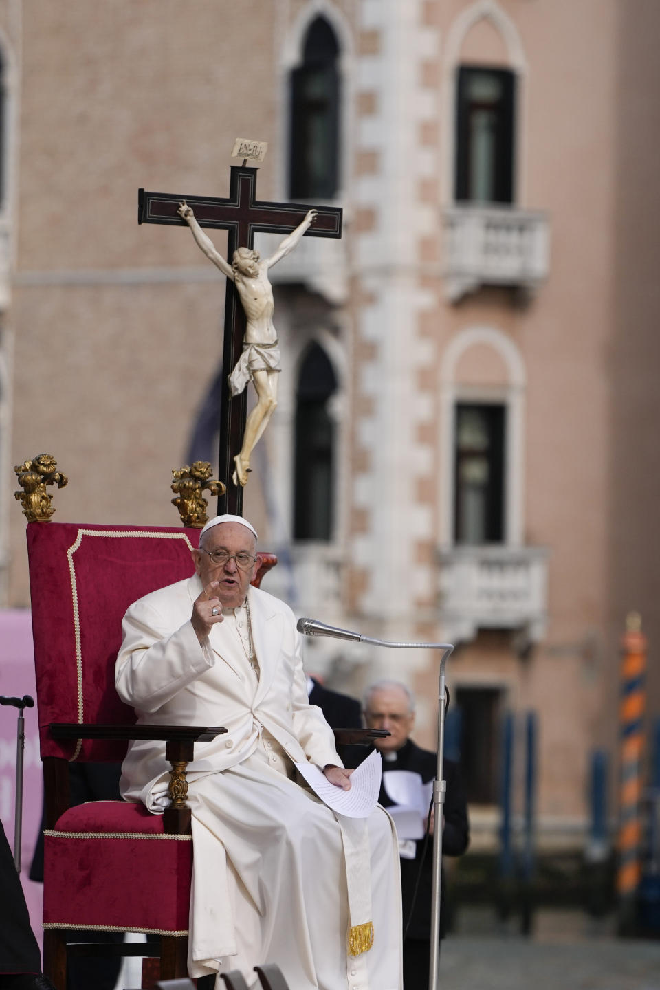 Pope Francis delivers his message as he meets with young people in front of the Church of the Salute in Venice, Italy, Sunday, April 28, 2024. The Pontiff arrived for his first-ever visit to the lagoon town including the Vatican pavilion at the 60th Biennal of Arts. (AP Photo/Alessandra Tarantino)