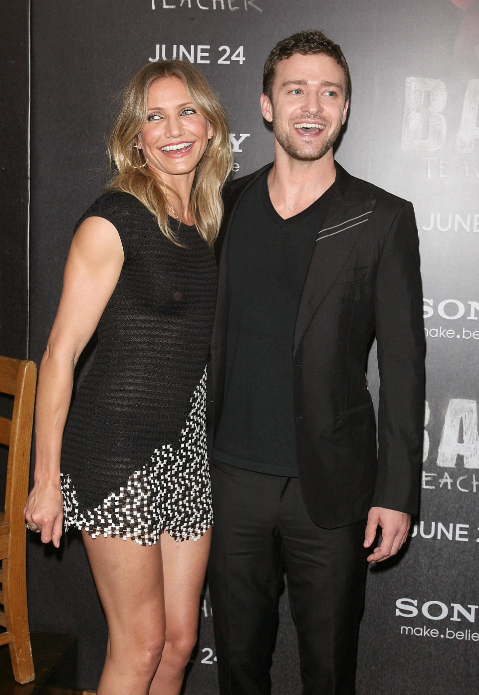 Cameron and Justin smiling together at a media event