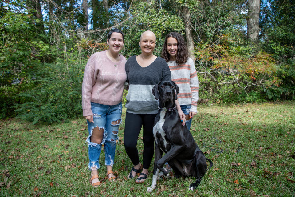 Mary Ellen Plewes with her daughters Annabelle, left, and Abigayle Vannoi and their Great Dane Luna