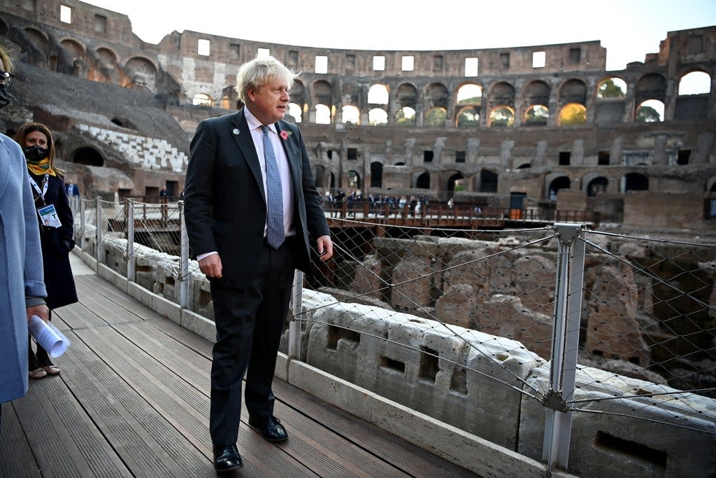 Prime Minister Boris Johnson visits the Colosseum during the G20 summit in Rome, Italy (Jeff J Mitchell/PA) (PA Wire)