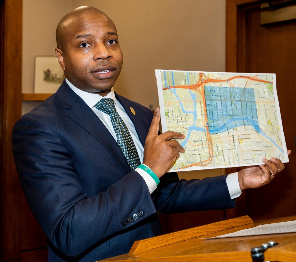 Milwaukee Mayor Cavalier Johnson on Wednesday holds a map showing the security zone that will be in place surrounding the convention site for the Republican National Convention in downtown this summer.