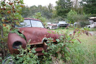 <p>This Henry J clearly hasn’t moved in a very long time. It was found in Old Car City, undoubtedly one of the greatest vintage salvage yards in the US. We were told by one of the guys working in the yard that it’s a 1952 Vagabond, which means it’s one of 15,900 built. </p><p>These entry level cars were severely lacking in creature comforts, with tail lights, reversing lights, a heater and even an opening <span>boot </span>lid all being options.</p>