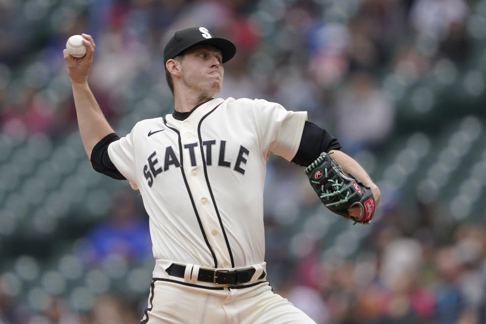 Seattle Mariners starting pitcher Chris Flexen throws against the Los Angeles Angels during the first inning of the first baseball game of a doubleheader, Saturday, June 18, 2022, in Seattle. (AP Photo/Ted S. Warren)