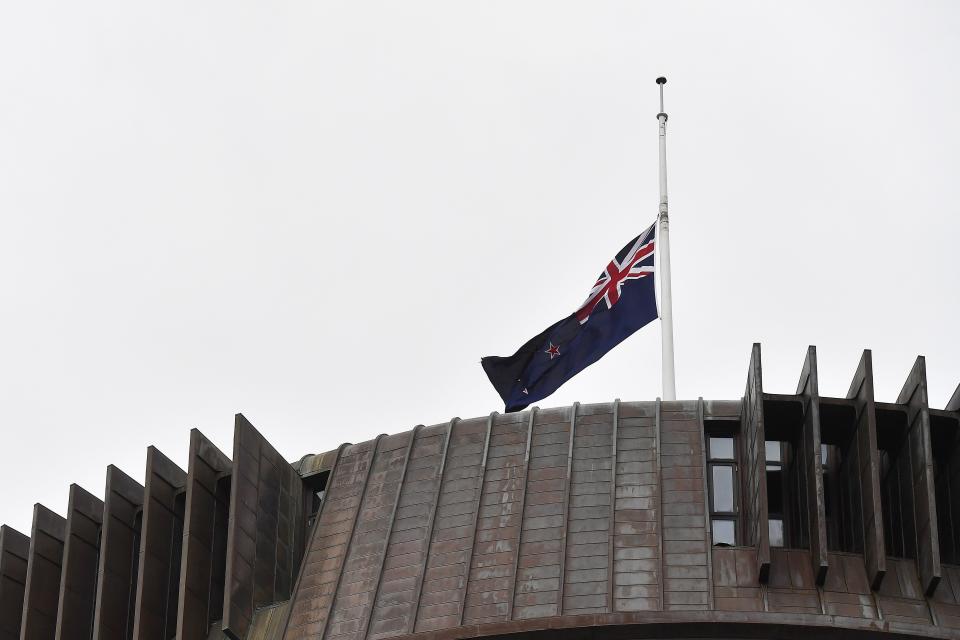 WELLINGTON, NEW ZEALAND - MARCH 16: New Zealand flag flies at half mast on the roof of the Beehive on March 16, 2019 in Wellington, New Zealand. At least 49 people are confirmed dead, with more than 40 people injured following attacks on two mosques in Christchurch on Friday afternoon. (Photo by Mark Tantrum/Getty Images) ORG XMIT: 775316174 ORIG FILE ID: 1136042627