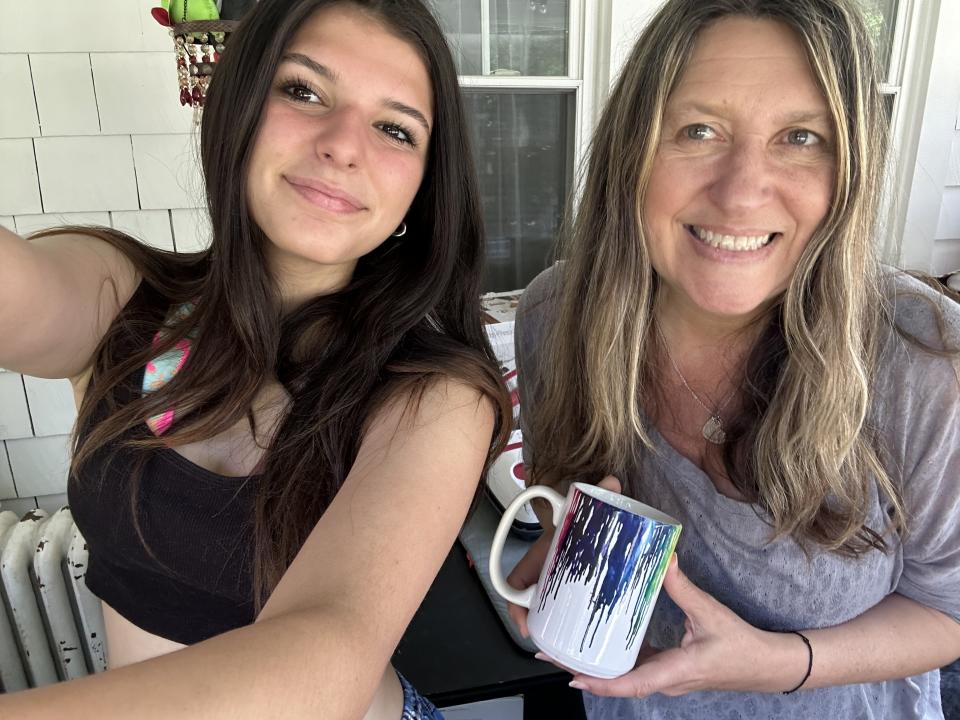 Daughter and writer with mug creation