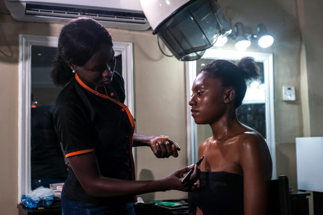 The preference for lighter skin has its roots in colonial histories. <a href="https://www.gettyimages.com/detail/news-photo/beautician-applies-a-skin-toning-treatment-on-a-woman-at-a-news-photo/1013442704" rel="nofollow noopener" target="_blank" data-ylk="slk:STEFAN HEUNIS/AFP via Getty Images;elm:context_link;itc:0;sec:content-canvas" class="link ">STEFAN HEUNIS/AFP via Getty Images</a>