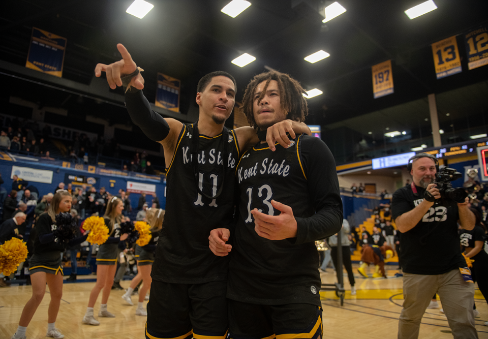 Kent State's Giovanni Santiago and Jalen Sullinger leave the floor after ringing the victory bell on Jan. 20.