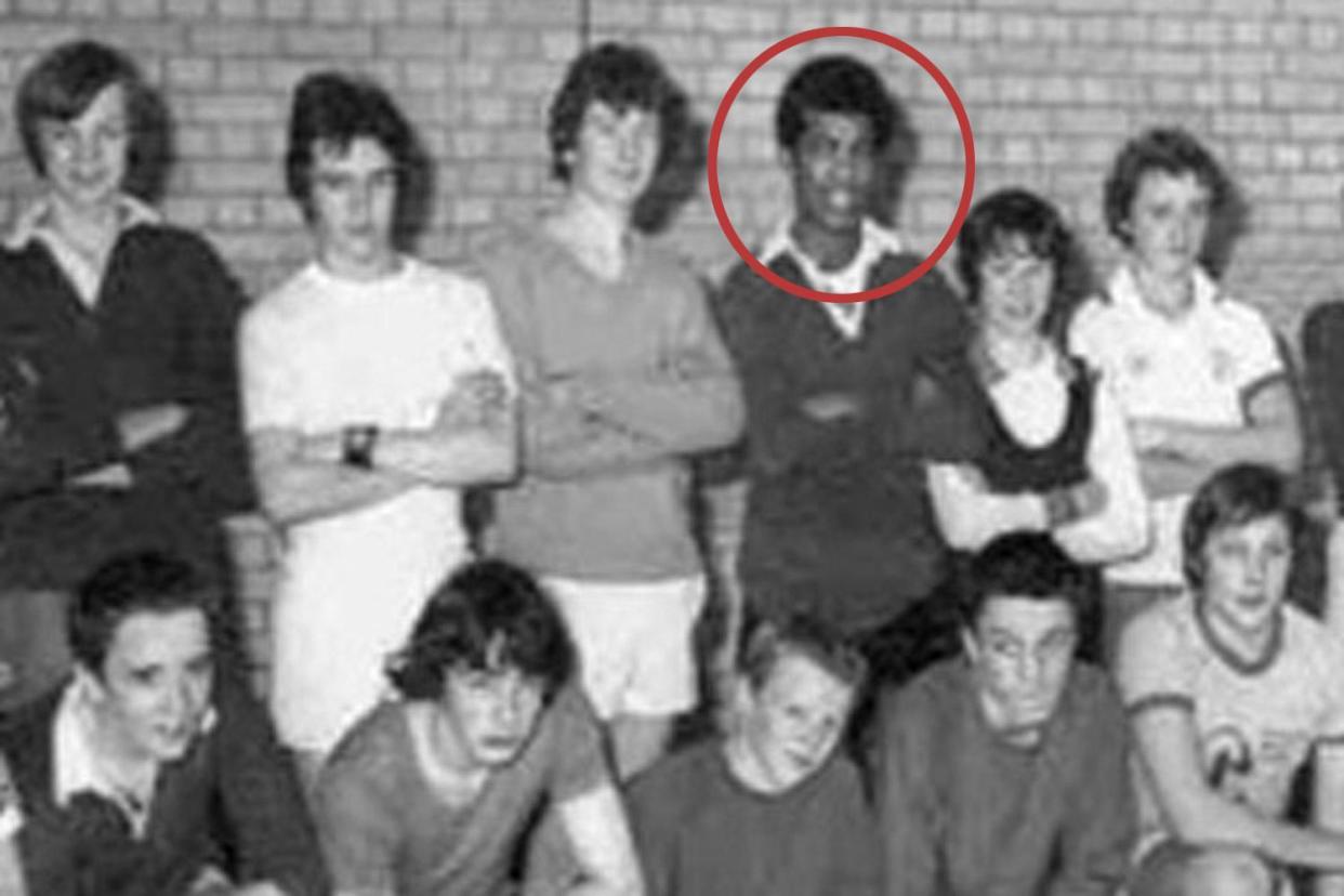 Adrian Ajao, circled, pictured with his school football team
