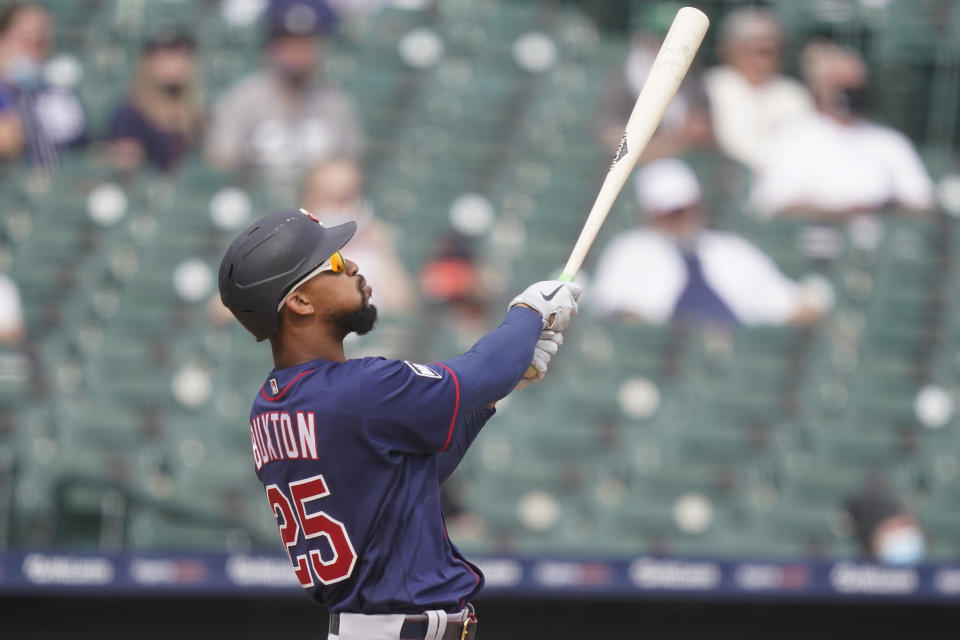 Minnesota Twins' Byron Buxton watches his solo home run during the eighth inning of a baseball game against the Detroit Tigers, Tuesday, April 6, 2021, in Detroit. (AP Photo/Carlos Osorio)