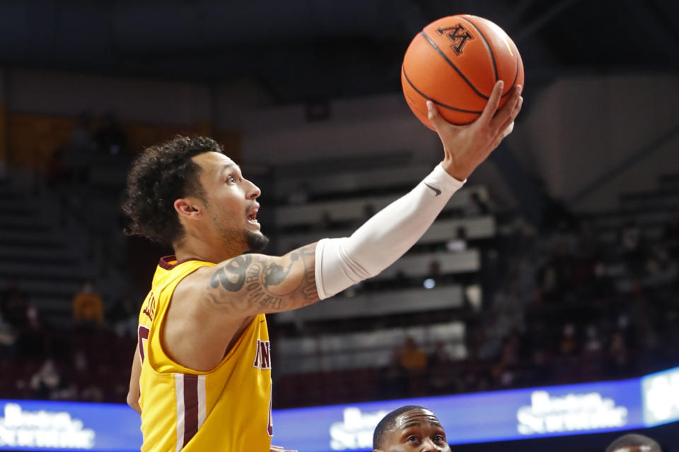 Minnesota guard Payton Willis (0) goes to the basket against Ohio State in the first half of an NCAA college basketball game Thursday, Jan. 27, 2022, in Minneapolis. (AP Photo/Bruce Kluckhohn)