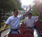 PAP's Dr Koh Poh Koon and MP Teo Ser Luck on the parade vehicle. Koh says everyone did their best.