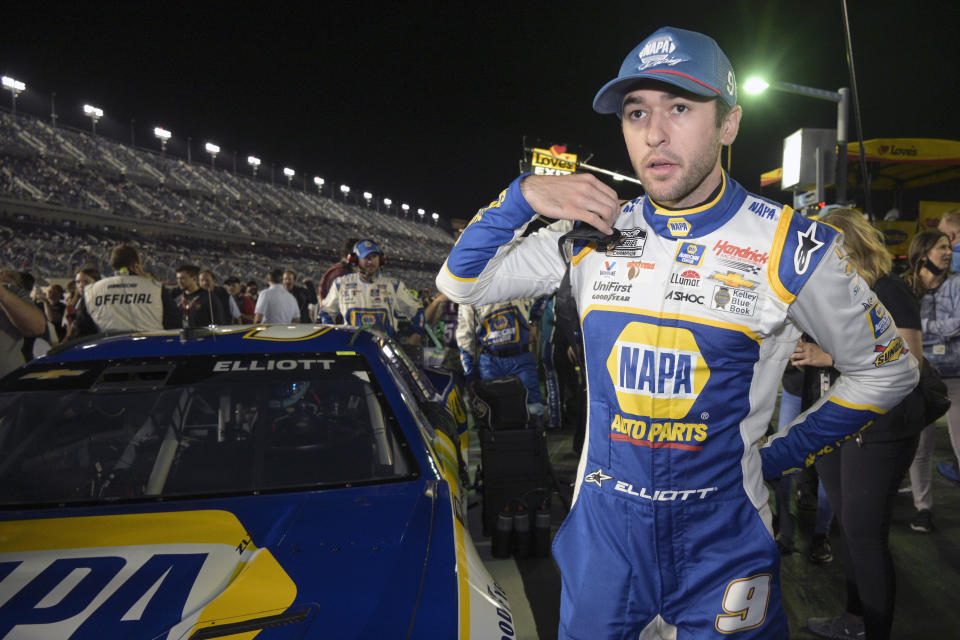 Chase Elliott gets ready on pit road to compete in a NASCAR Daytona 500 qualifying auto race at Daytona International Speedway, Thursday, Feb. 17, 2022, in Daytona Beach, Fla. (AP Photo/Phelan M. Ebenhack)