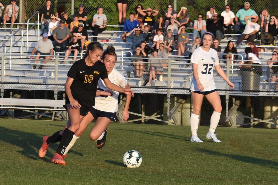 Richmond Hill's Courtney Allen takes a shot on goal. She had one of the Wildcats' two goals in a 4-2 loss to River Ridge on Monday night in Richmond Hill.