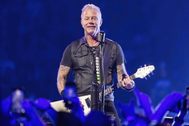 <p>Scott Legato/Getty Images</p> James Hetfield performing with Metallica in Detroit