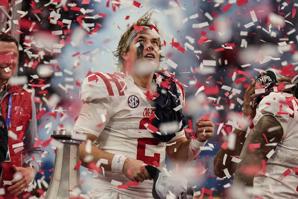 Mississippi quarterback Jaxson Dart (2) celebrates after the Peach Bowl NCAA college football game between Penn State and Mississippi, Saturday, Dec. 30, 2023, in Atlanta. Mississippi won 38-25. (AP Photo/Brynn Anderson)