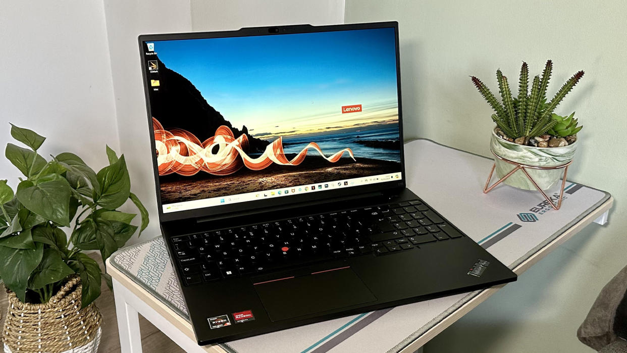  Lenovo ThinkPad E16 showing desktop on a table. . 